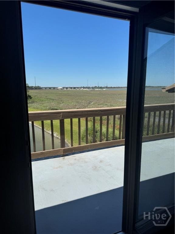 142 Bull River Bluff Dr, Savannah, GA 31410 - doorway featuring concrete flooring