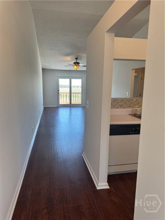 142 Bull River Bluff Dr, Savannah, GA 31410 - hall with dark wood finished floors and baseboards