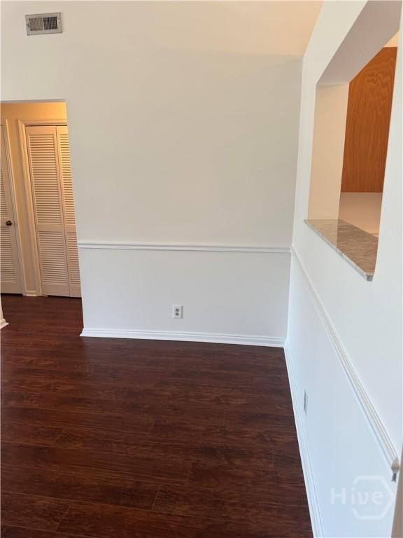 142 Bull River Bluff Dr, Savannah, GA 31410 - empty room featuring dark wood-type flooring and baseboards