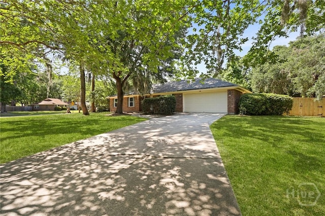 203 Whittington Dr, Savannah, GA 31419 - ranch-style home with brick siding, driveway, a garage, and view of scattered trees