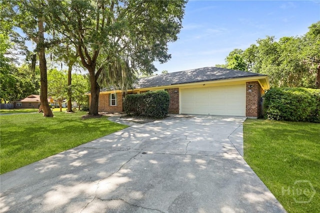 203 Whittington Dr, Savannah, GA 31419 - ranch-style home featuring brick siding, a garage, driveway, and a front lawn