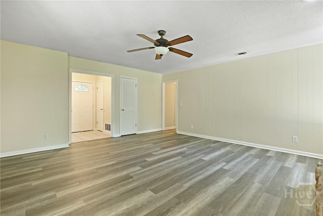 203 Whittington Dr, Savannah, GA 31419 - spare room featuring ceiling fan, baseboards, and wood finished floors