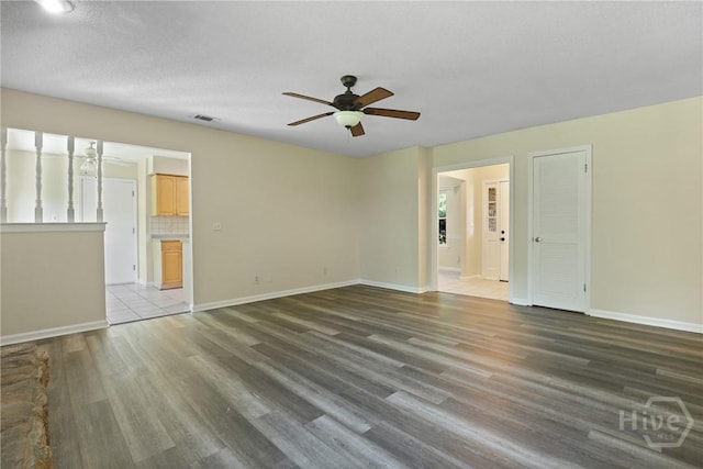 203 Whittington Dr, Savannah, GA 31419 - unfurnished room featuring a ceiling fan, wood finished floors, and baseboards