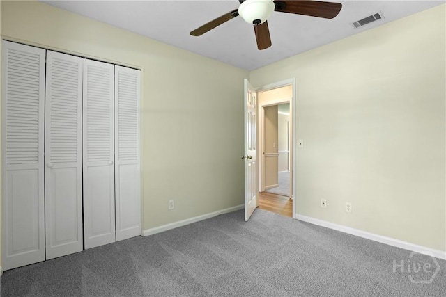 203 Whittington Dr, Savannah, GA 31419 - unfurnished bedroom featuring carpet floors, baseboards, a closet, and a ceiling fan