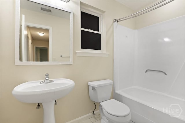 203 Whittington Dr, Savannah, GA 31419 - full bathroom featuring toilet, baseboards, shower / bathtub combination, and tile patterned flooring