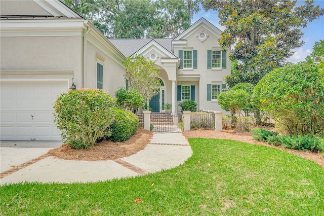 2 Franklin Creek Rd S, Savannah, GA 31411 - traditional home with stucco siding, a garage, a standing seam roof, a gate, and metal roof