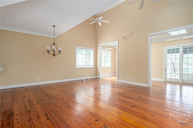 2 Franklin Creek Rd S, Savannah, GA 31411 - unfurnished room featuring a ceiling fan, high vaulted ceiling, a chandelier, baseboards, and hardwood / wood-style flooring