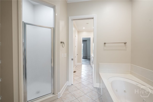 2 Franklin Creek Rd S, Savannah, GA 31411 - bathroom with a shower stall, tile patterned flooring, a jetted tub, baseboards, and crown molding