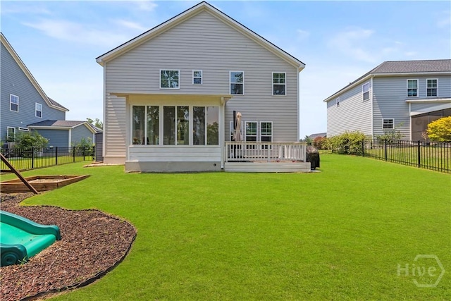 333 Waverly Ln, Richmond Hill, GA 31324 - rear view of property with a sunroom and a deck