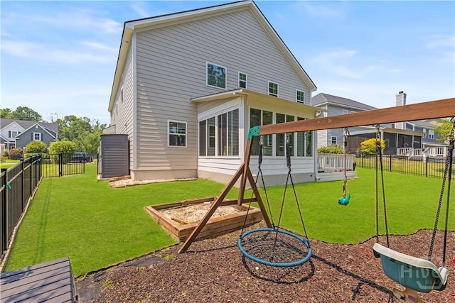 333 Waverly Ln, Richmond Hill, GA 31324 - back of house with a sunroom
