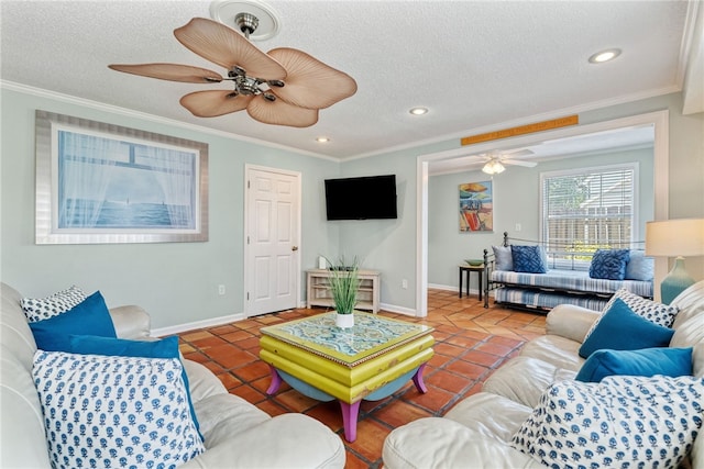 1406 Jones Ave, Tybee Island, GA 31328 - tiled living room featuring ceiling fan, recessed lighting, a textured ceiling, baseboards, and ornamental molding