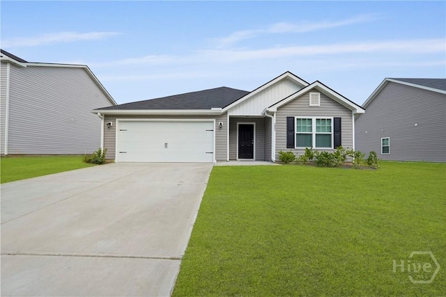 232 Cromer St, Savannah, GA 31407 - view of front of house with concrete driveway, an attached garage, board and batten siding, and a front yard