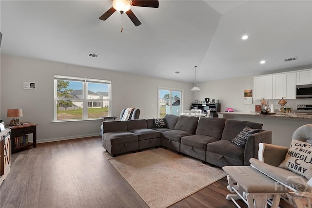 232 Cromer St, Savannah, GA 31407 - living area with dark wood-style flooring, vaulted ceiling, ceiling fan, recessed lighting, and baseboards