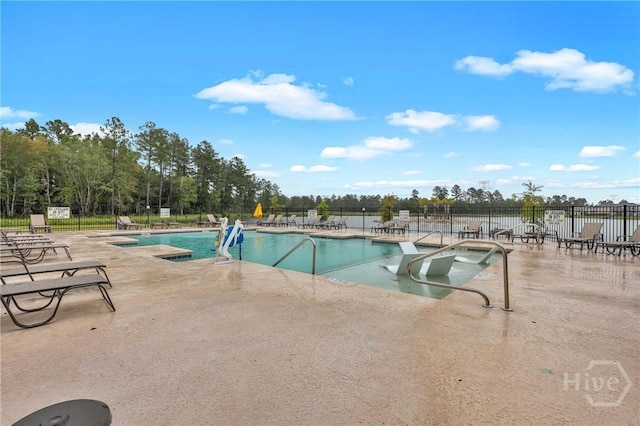 407 Coconut Dr, Bloomingdale, GA 31322 - community pool featuring a patio area