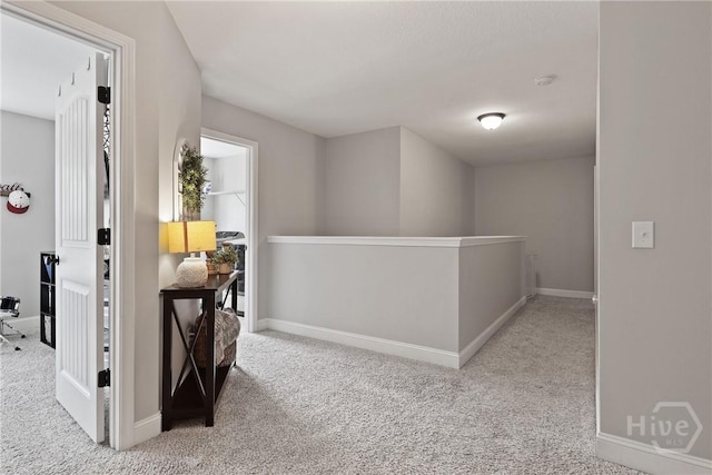 115 Meadowlands Dr, Rincon, GA 31326 - hallway featuring carpet flooring, an upstairs landing, and baseboards