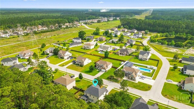 115 Meadowlands Dr, Rincon, GA 31326 - aerial perspective of suburban area featuring a forest