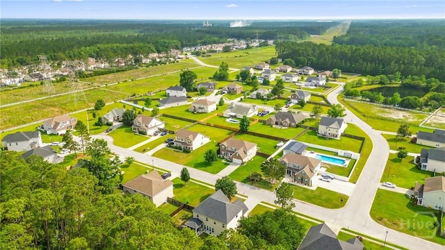 115 Meadowlands Dr, Rincon, GA 31326 - aerial perspective of suburban area with a forest