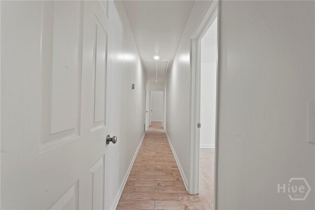 1939 Colonial Dr, Savannah, GA 31406 - corridor featuring attic access, light wood finished floors, and baseboards