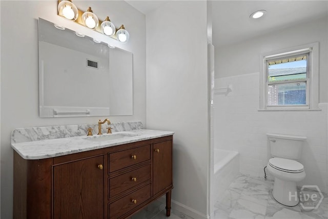 1939 Colonial Dr, Savannah, GA 31406 - full bathroom featuring marble finish floors, vanity, and toilet