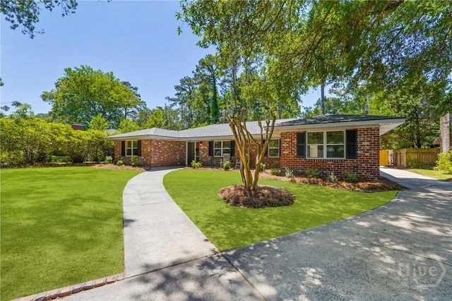 1939 Colonial Dr, Savannah, GA 31406 - ranch-style house with brick siding and concrete driveway