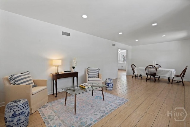 1939 Colonial Dr, Savannah, GA 31406 - living area featuring wood finished floors, recessed lighting, and baseboards