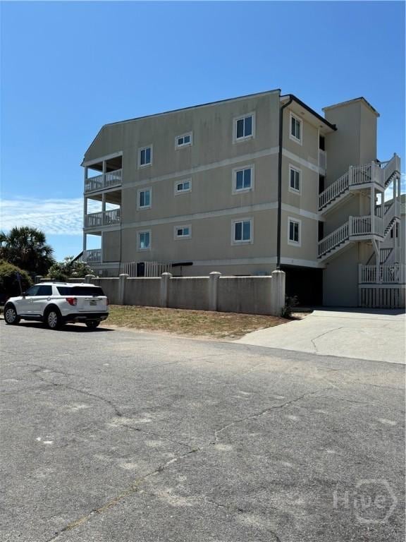 1 Center St Unit 3, Tybee Island, GA 31328 - view of property featuring driveway