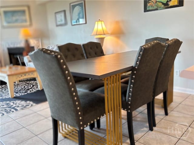 1 Center St Unit 3, Tybee Island, GA 31328 - dining space featuring tile patterned floors and baseboards