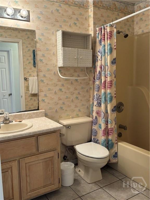 1 Center St Unit 3, Tybee Island, GA 31328 - full bathroom featuring wallpapered walls, tile patterned floors, toilet, vanity, and shower / tub combo with curtain