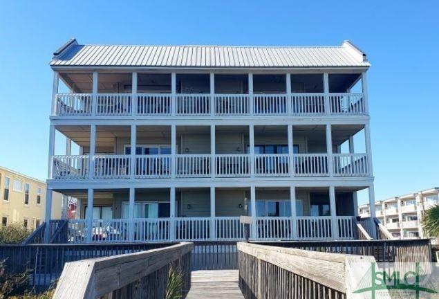 1 Center St Unit 3, Tybee Island, GA 31328 - view of front of property featuring metal roof