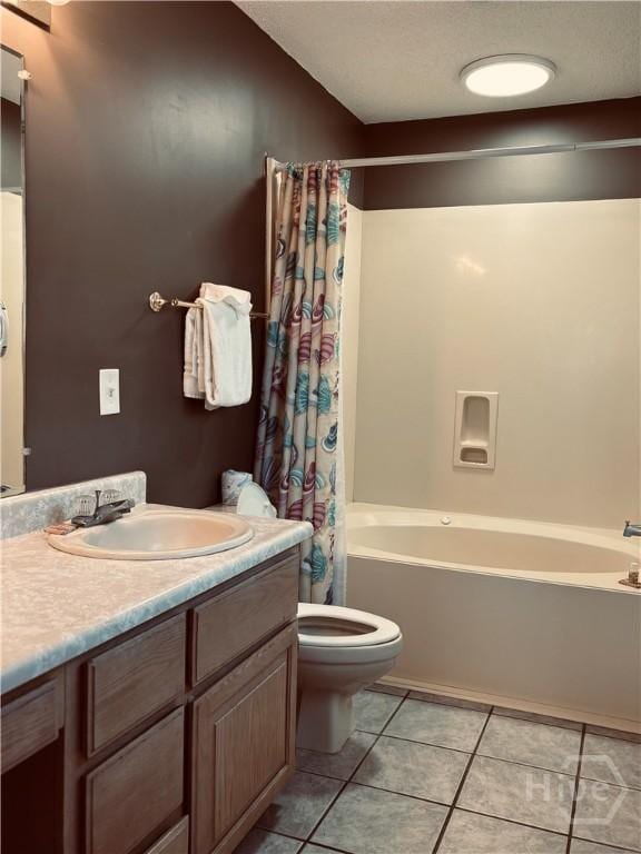 1 Center St Unit 3, Tybee Island, GA 31328 - bathroom featuring vanity, tile patterned flooring, toilet, and shower / tub combo with curtain