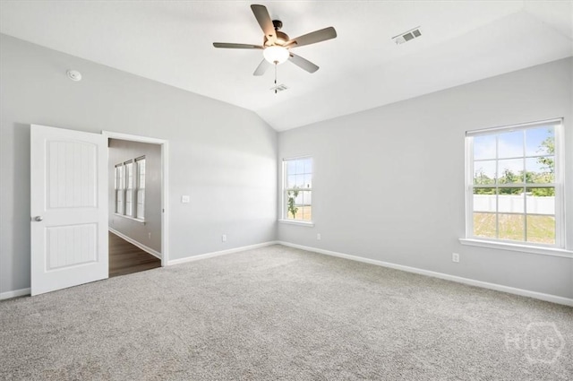 301 Akins Ranch Rd NE, Ludowici, GA 31316 - carpeted empty room with vaulted ceiling, baseboards, and ceiling fan