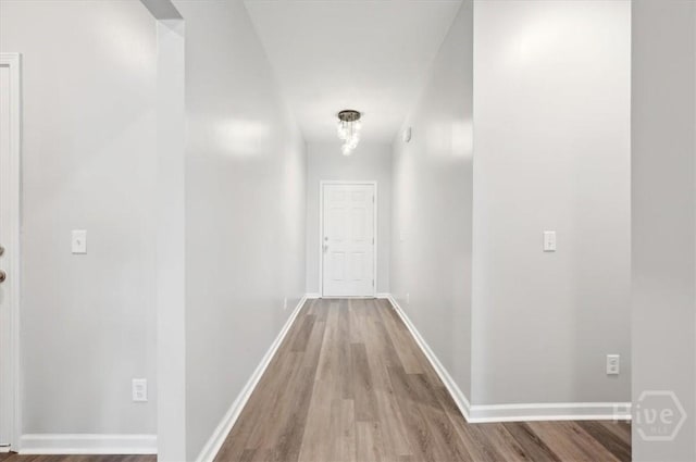 301 Akins Ranch Rd NE, Ludowici, GA 31316 - hallway featuring wood finished floors and baseboards
