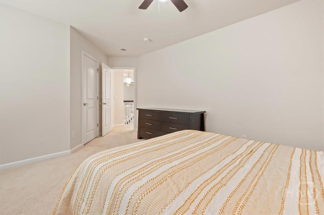 45 Glen Way, Richmond Hill, GA 31324 - bedroom with light carpet, baseboards, and a ceiling fan