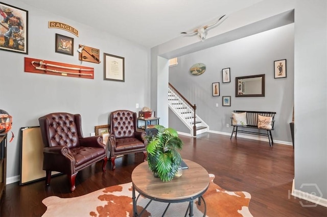 45 Glen Way, Richmond Hill, GA 31324 - sitting room with stairway, wood finished floors, and baseboards