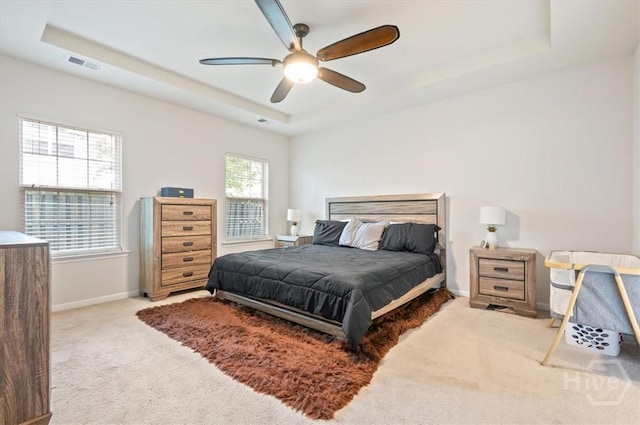 45 Glen Way, Richmond Hill, GA 31324 - carpeted bedroom featuring a tray ceiling, baseboards, and a ceiling fan