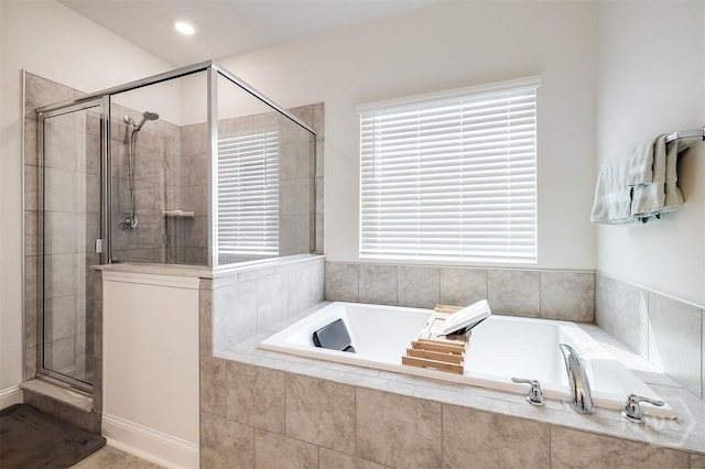 202 Thatcher St, Guyton, GA 31312 - full bath featuring a stall shower and a bath