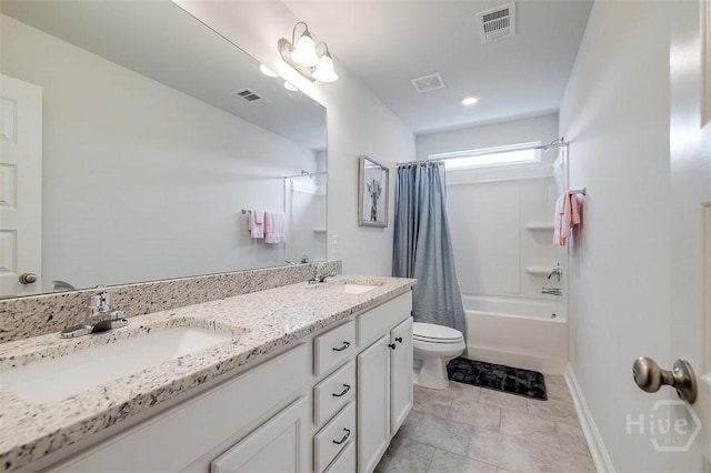 202 Thatcher St, Guyton, GA 31312 - full bathroom featuring toilet, shower / tub combo with curtain, double vanity, and baseboards