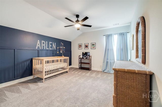 202 Thatcher St, Guyton, GA 31312 - bedroom with carpet, vaulted ceiling, a ceiling fan, baseboards, and a crib