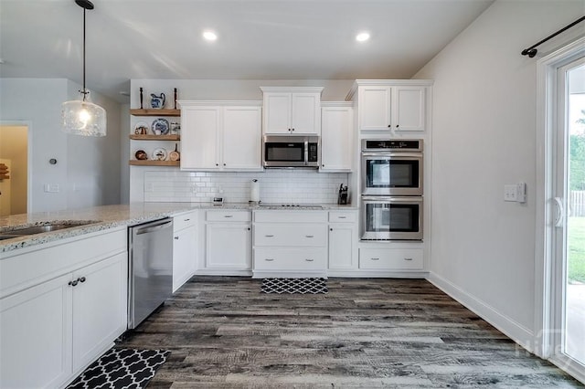 202 Thatcher St, Guyton, GA 31312 - kitchen with appliances with stainless steel finishes, open shelves, white cabinets, plenty of natural light, and recessed lighting