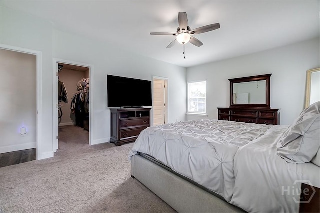 202 Thatcher St, Guyton, GA 31312 - bedroom with carpet floors, a walk in closet, baseboards, and a closet