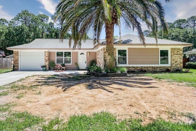 1522 Marcy Cir, Savannah, GA 31406 - view of front facade with driveway and an attached garage