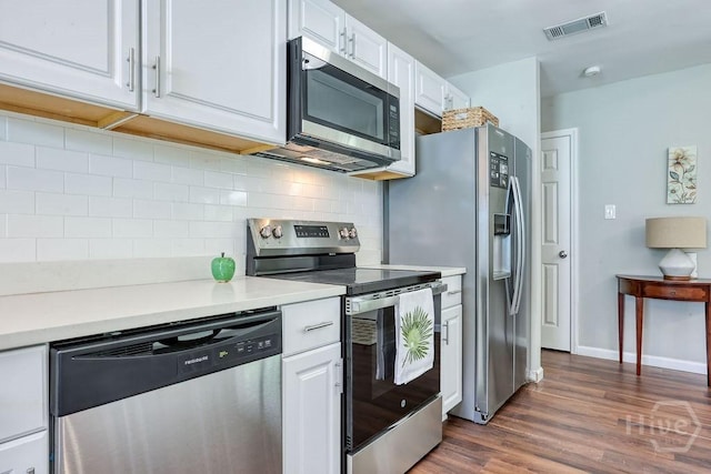 1522 Marcy Cir, Savannah, GA 31406 - kitchen featuring stainless steel appliances, white cabinets, and light countertops