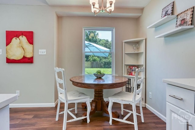 1522 Marcy Cir, Savannah, GA 31406 - dining area with a chandelier, wood finished floors, and baseboards