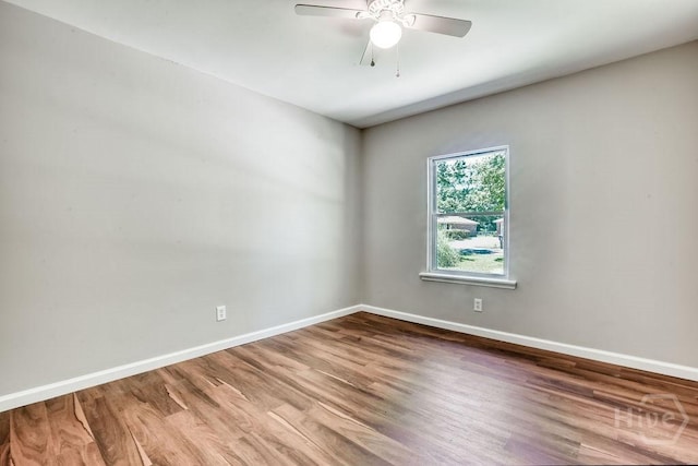 1522 Marcy Cir, Savannah, GA 31406 - empty room with wood finished floors, baseboards, and a ceiling fan