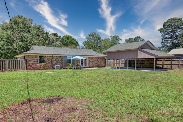1522 Marcy Cir, Savannah, GA 31406 - back of house featuring a patio area and brick siding
