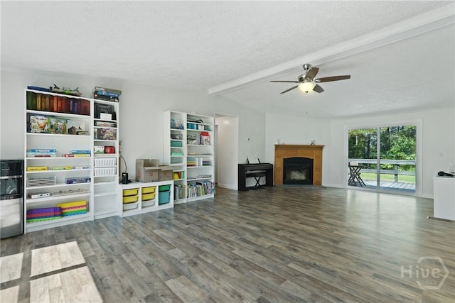 132 Waymaker Dr, Midway, GA 31320 - living room with a textured ceiling, ceiling fan, wood finished floors, a fireplace, and baseboards