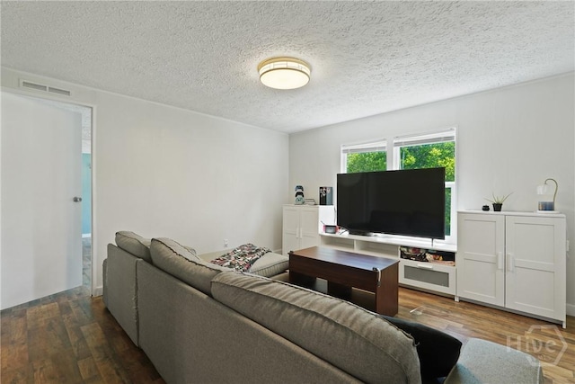 132 Waymaker Dr, Midway, GA 31320 - living area with wood finished floors and a textured ceiling
