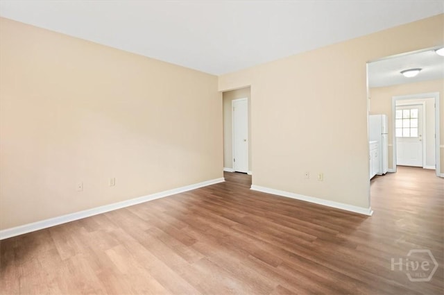 310 Ashmore St Unit A, B, Hinesville, GA 31313 - empty room with wood finished floors and baseboards