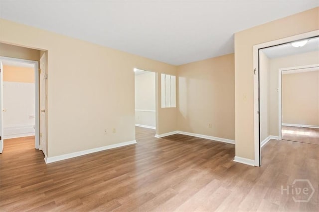 310 Ashmore St Unit A, B, Hinesville, GA 31313 - unfurnished room with wood finished floors and baseboards