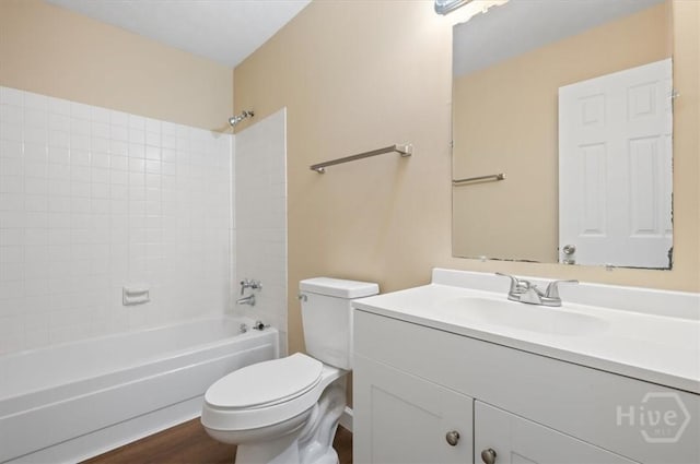 310 Ashmore St Unit A, B, Hinesville, GA 31313 - bathroom with toilet, vanity, bathing tub / shower combination, and wood finished floors
